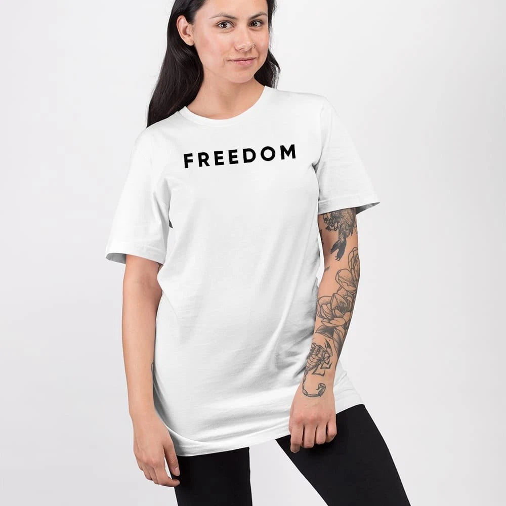 Woman wearing the conservative FREEDOM shirt, showing a comfortable fit for female patriots.